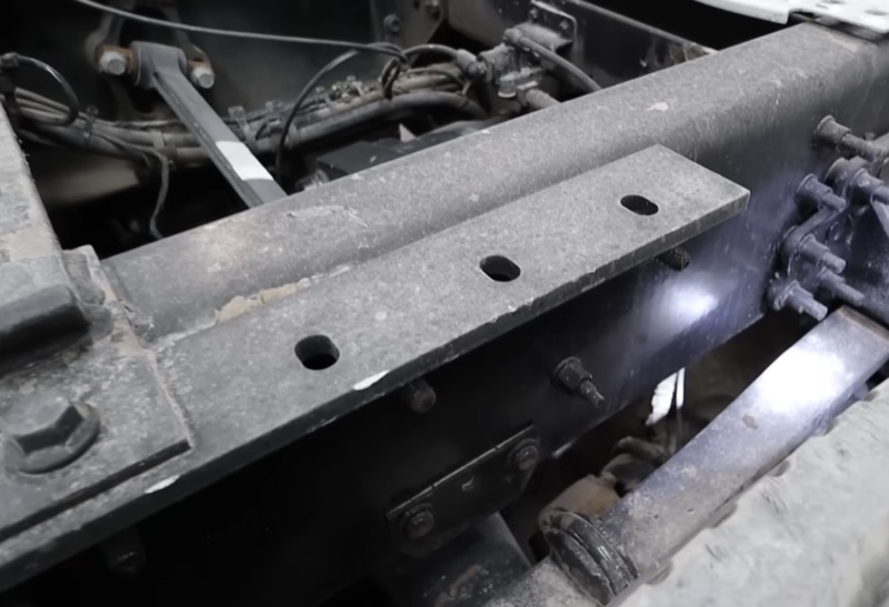 Heavy-duty truck frame crossmember and chassis inspection